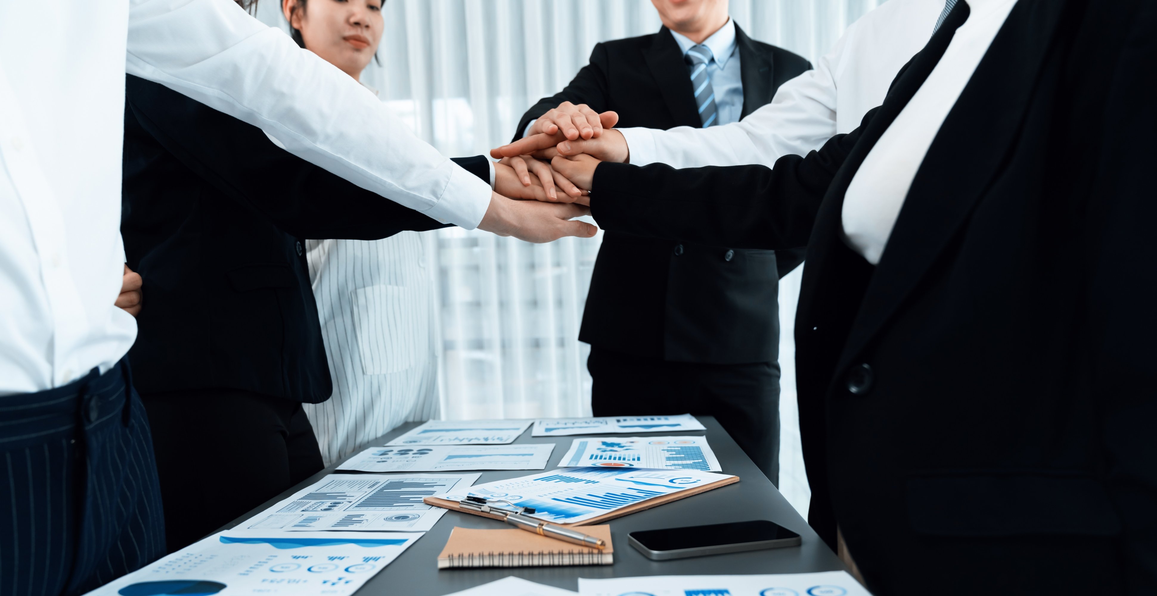 closeup-business-team-join-hand-stack-together-harmony-concept